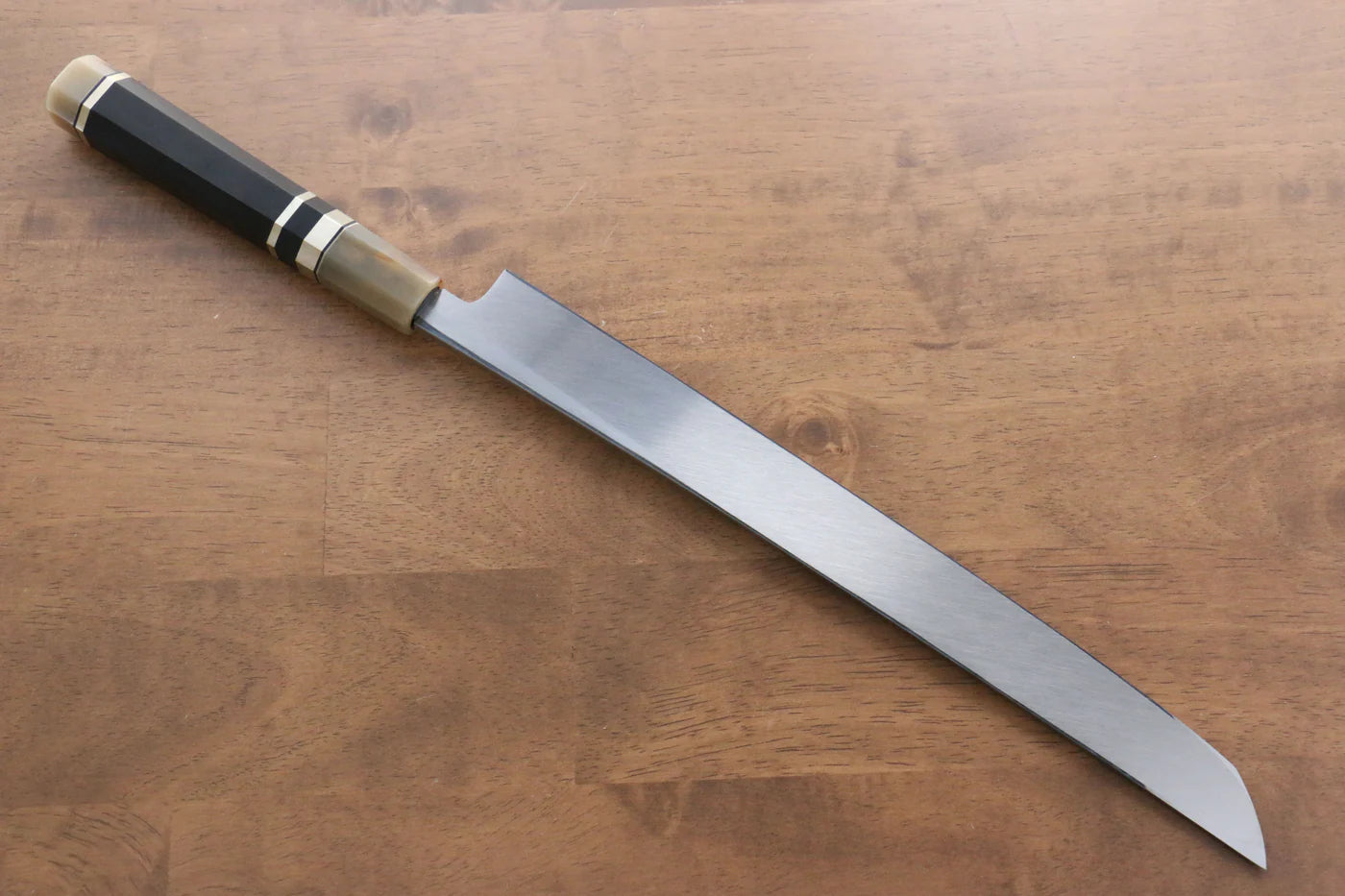 Jikko White Steel (เหล็กกล้าขาว) มีด Sakimaru Yanagiba มีดทำครัวญี่ปุ่น 300mm ด้ามไม้มะเกลือ (ประดับห่วงคู่)